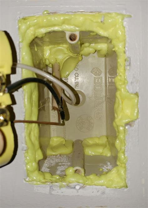 sealing electrical outlets spray foam